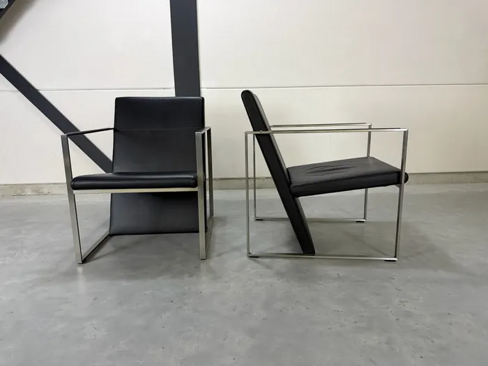 Fauteuil Arco Spine, cuir noir & acier
